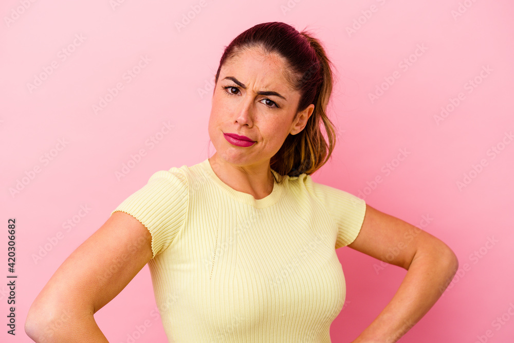 Young caucasian woman isolated on pink background Young caucasian woman isolated on pink background