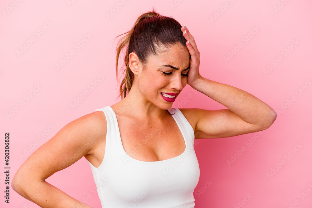 Young caucasian woman isolated on pink background Young caucasian woman isolated on pink background