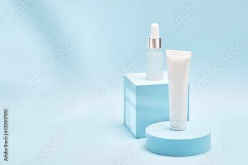 Two cosmetic product mockups on geometric podiums. Background for presentation of cosmetic