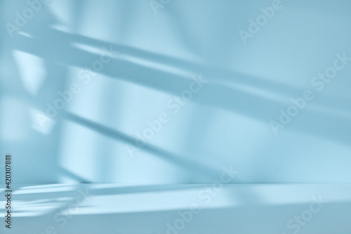 Abstract blue background with drop shadow and light. Backdrop for product presentation