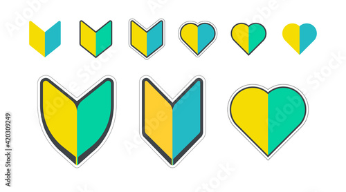 Japanese symbol for beginner new drivers. A yellow blue and green shield symbol, heart shape, called a Shoshinsha  Wakaba mark.
