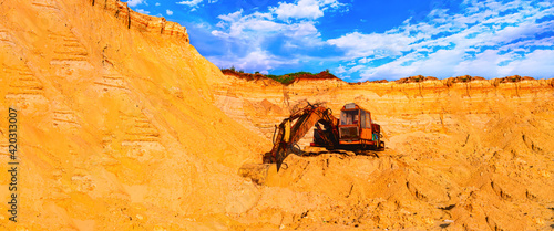 Sand mining industry, quarry sand excavator heavy machinery - Old rusty bulldozer machine at break