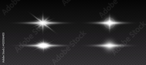 Glowing light effects. Sparkling and shining stars, bright flashes of lights with radiating