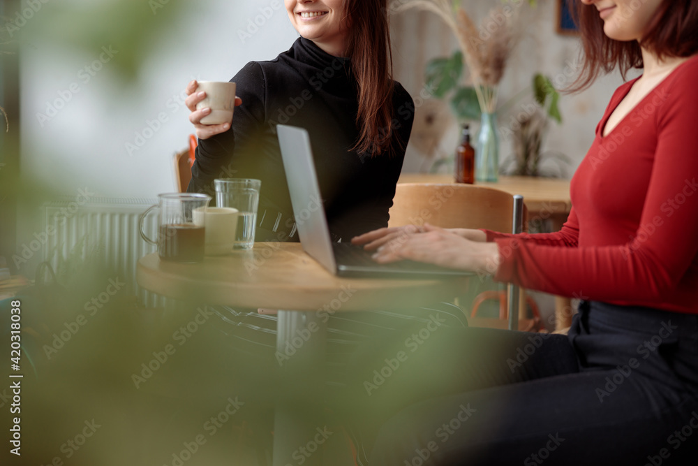 Young happy beautiful caucasian woman in cozy modern cafe Young happy beautiful caucasian woman in cozy modern cafe