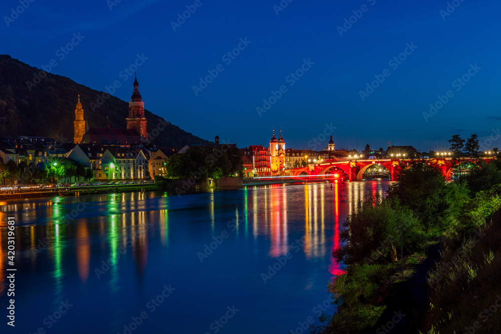 Panoramic view of Heidelberg old town, the Karl Theodor Bridge and the Church of the Holy Spirit, Germany.