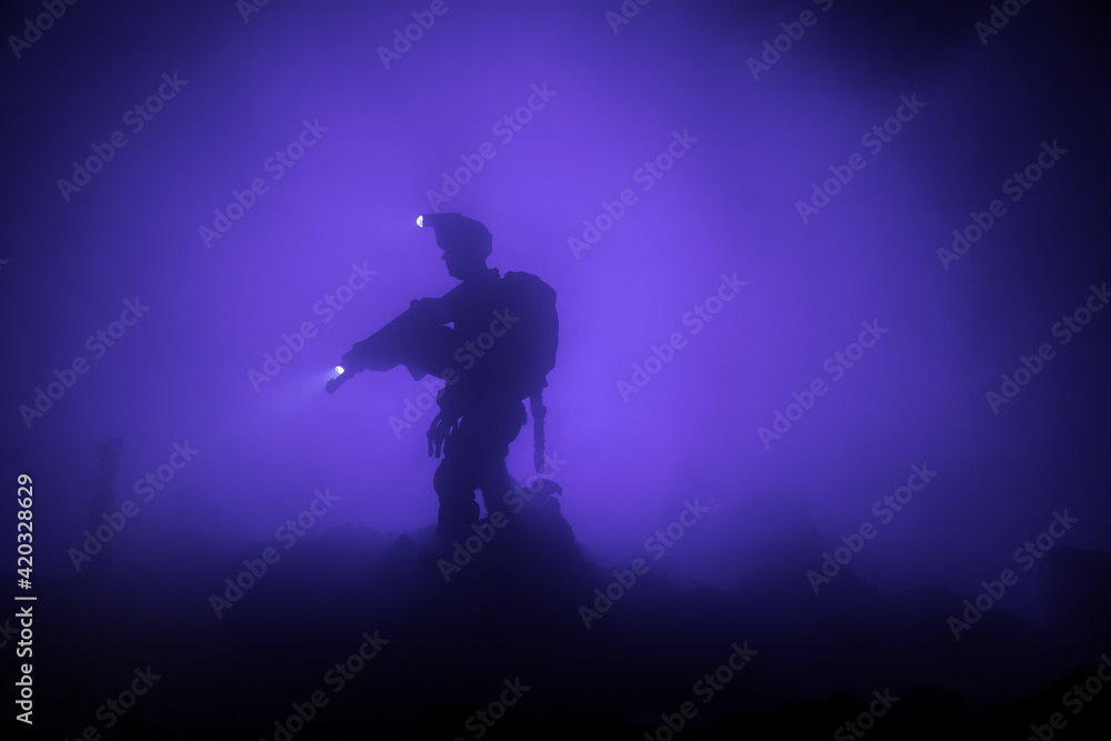 Fototapeta premium Anti-riot police give signal to be ready. Government power concept. Police in action. Smoke on a dark background with lights. Blue red flashing sirens. Dictatorship power