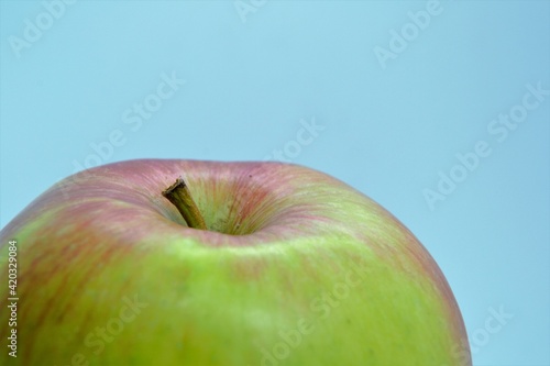 An apple - edible fruit from an apple tree (Malus domestica)