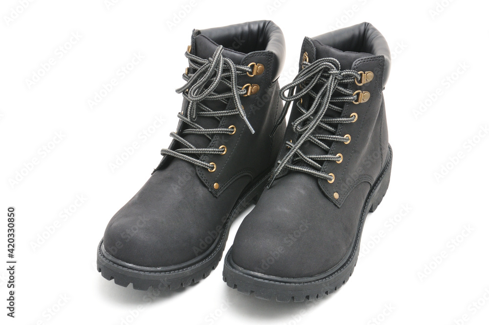 Suede boots with thick soles on a white background Suede boots with thick soles on a white background