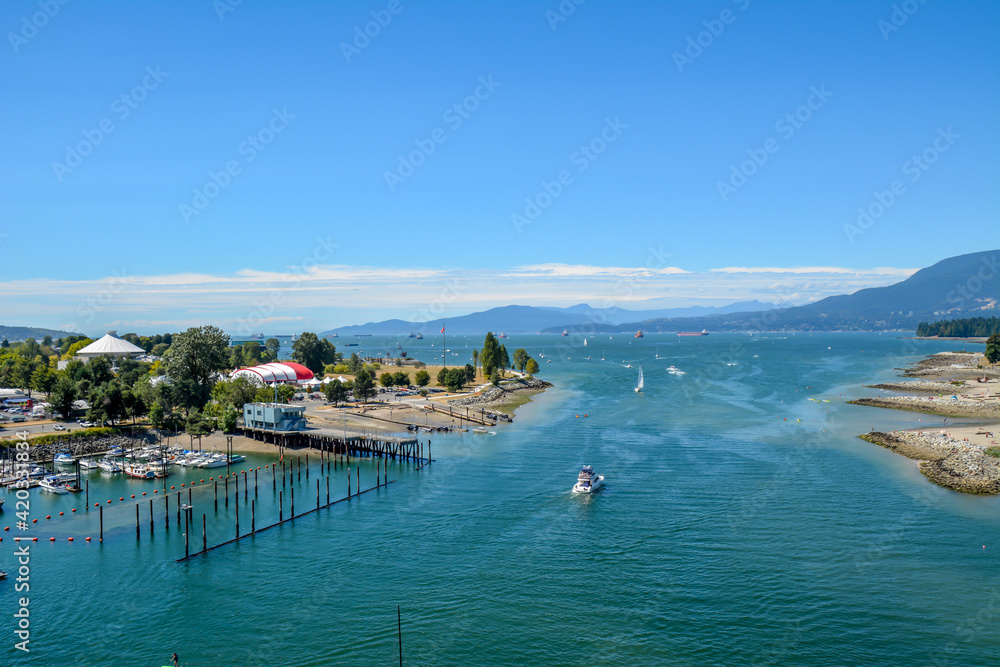 harbor of boats along a waterway and public boat ramp Vancouver Canada
