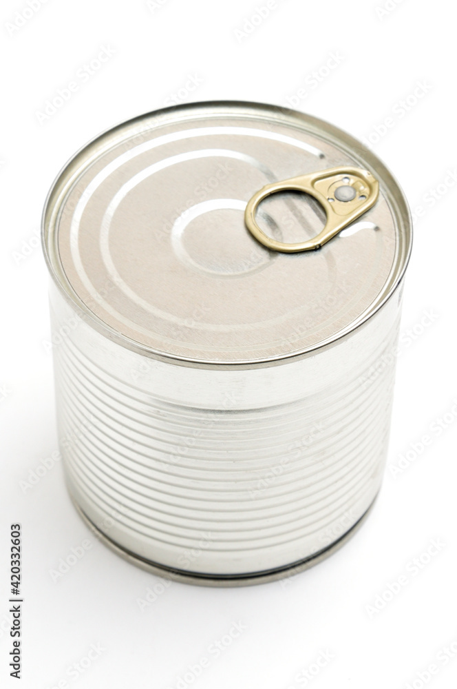 Metal tin can with green peas on a white background Metal tin can with green peas on a white background