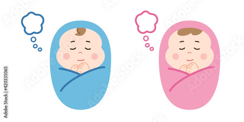 Dreaming newborn babies swaddled in a blanket.