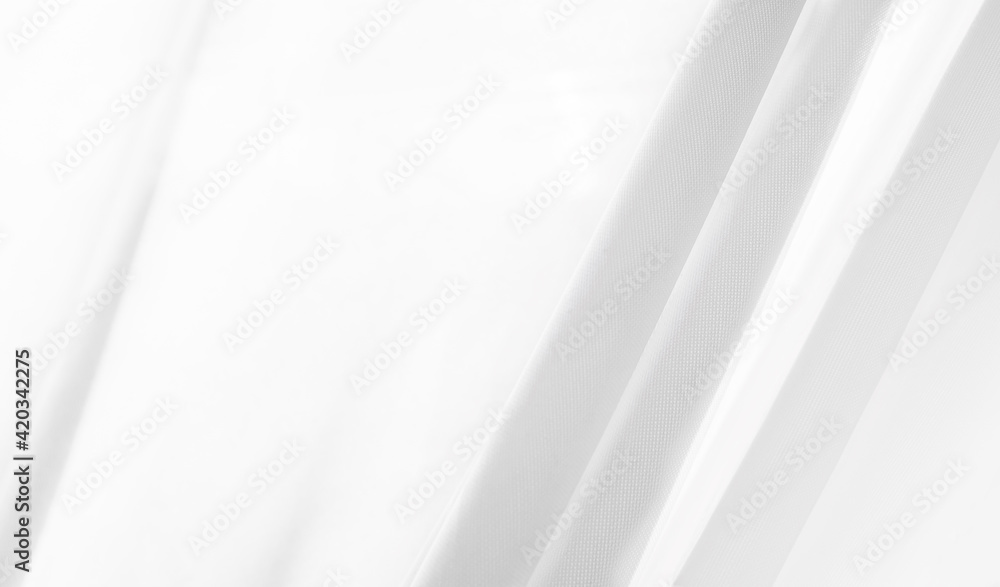 White silk fabric background containing abstract and art. White curtains, Natural linen texture background concept White silk fabric background containing abstract and art. White curtains, Natural linen texture background concept