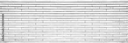 Panorama of simple white brick wall pattern for industrial and minimalism wallpaper and background design