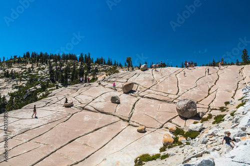 majestic summer views of  granite rock formations and the Half Dome as viewed from Olmstead Point near Tioga Pass in Yosemite, California. photo