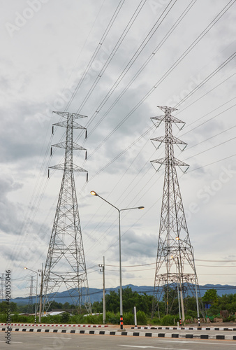 Wallpaper Mural Portrait Two High Voltage Tower or High Voltage Post Beside The Road and Sky Background with Natural Green Tree Torontodigital.ca