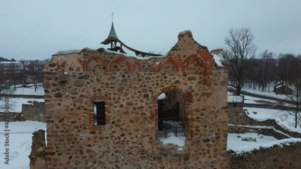 Ruins of Ancient Livonian Order's Stone Medieval Castle Latvia Aerial Drone Top Shot From Above . Restored Castle Capella at Winter in Dobele City. 4K Resolution Ruins of Ancient Livonian Order's Stone Medieval Castle Latvia Aerial Drone Top Shot From Above . Restored Castle Capella at Winter in Dobele City. 4K Resolution
