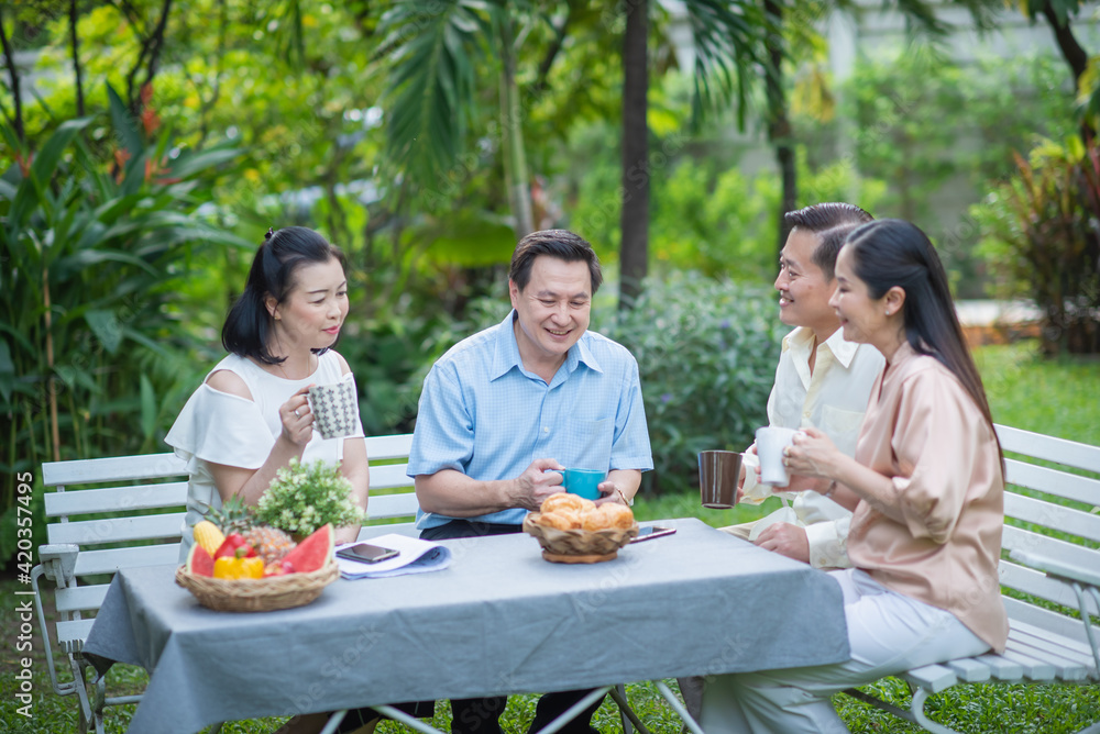 Group of asia family and friends happiness meeting, Lifestyle people middle age outdoor party. Communication social online life of asian people.