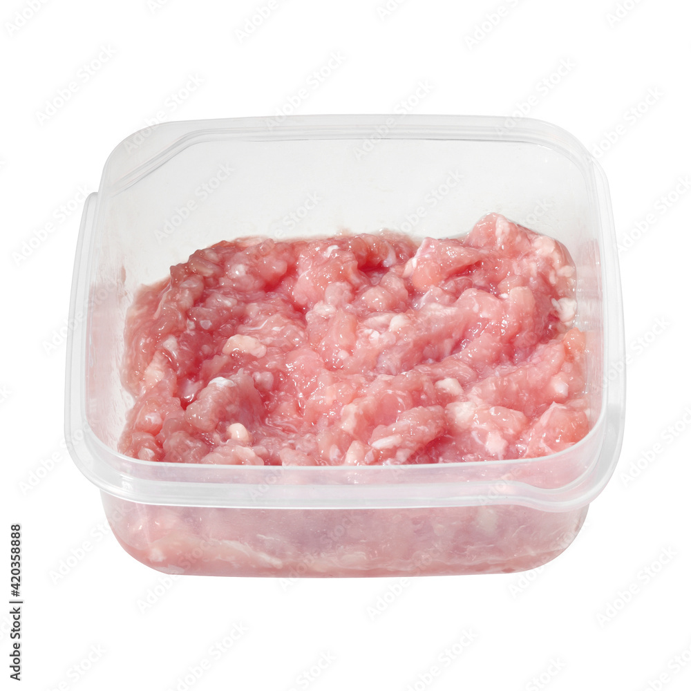 Pork minced in plastic box on white background Pork minced in plastic box on white background