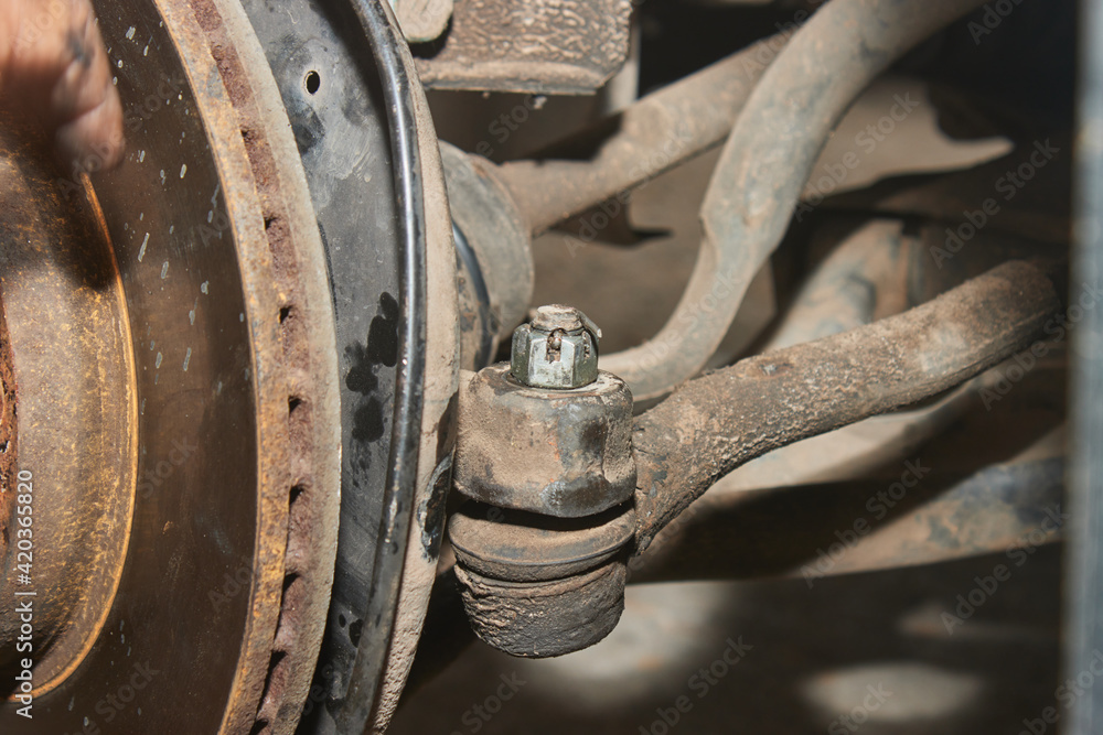 Zoom View Outer Tie Rod End and Disk Brake on Wheel Hub and Front CV Axle Drive Shaft Zoom View Outer Tie Rod End and Disk Brake on Wheel Hub and Front CV Axle Drive Shaft
