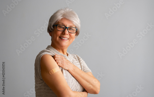 Photography Senior woman after vaccination.