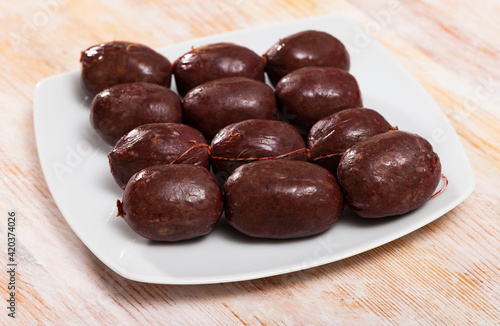 Wallpaper Mural Blood sausage black pudding on wooden background Torontodigital.ca