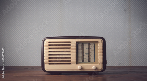 antique radio on vintage background photo