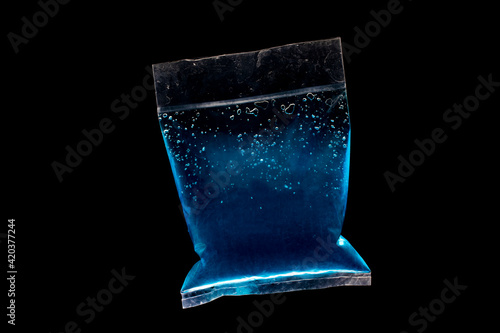 The blue temperature gel on a black background