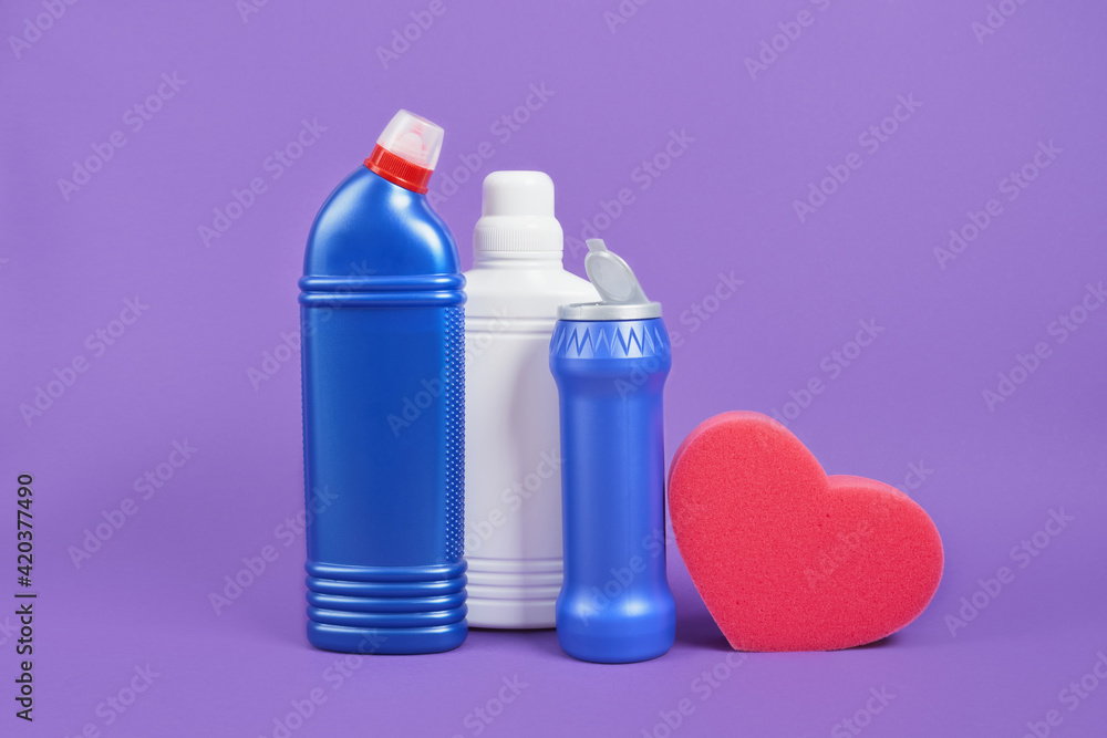red heart shape sponge and detergent bottles without labels ...