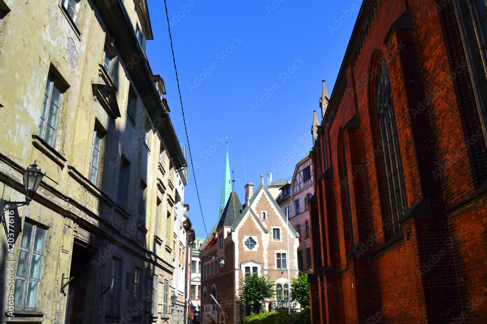 Empty street with historic buildings in the Old Town of Riga, Latvia, Baltic States
