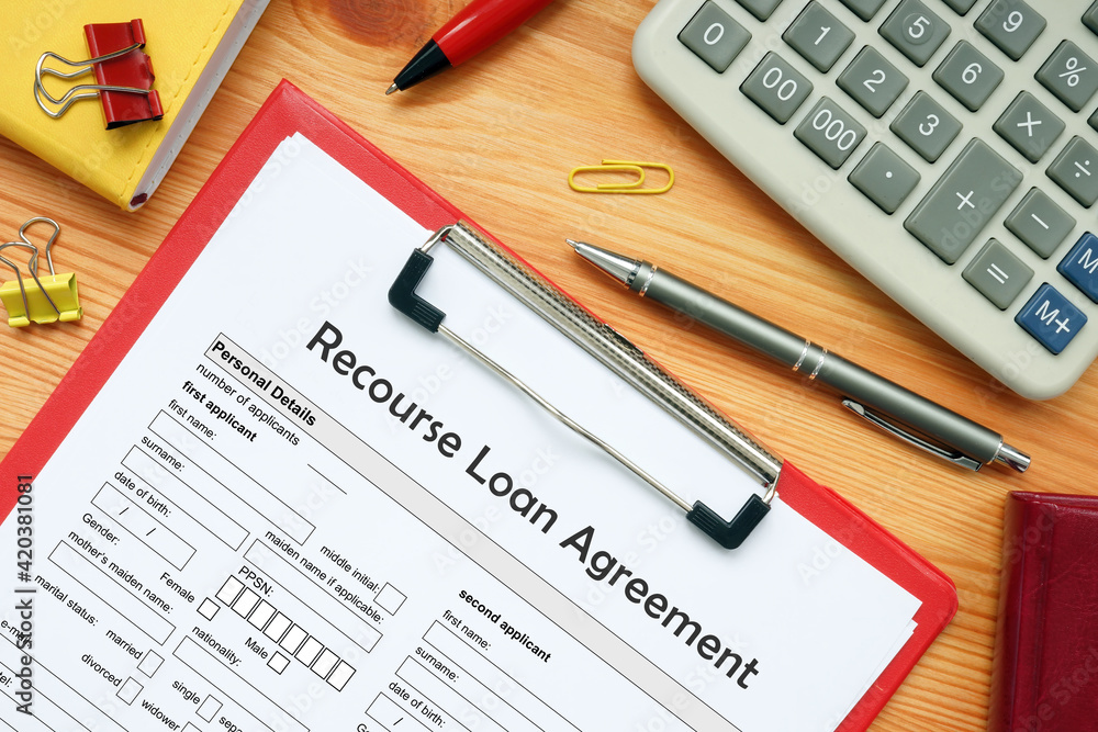 Business concept about Recourse Loan Agreement with phrase on the business paper Business concept about Recourse Loan Agreement with phrase on the business paper