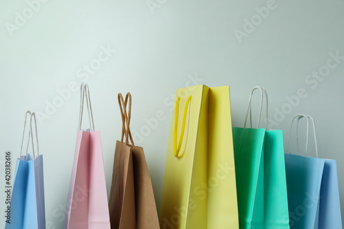 Blank colorful paper bags on white background