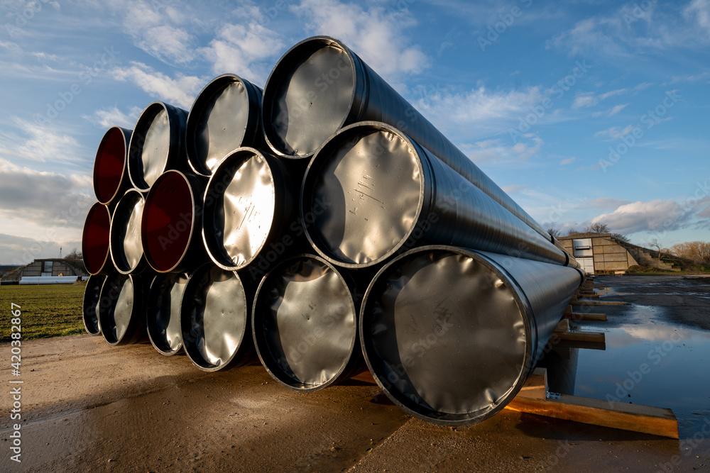 A stack of pipes on the construction site of a gas pipeline that will be laid on the seabed A stack of pipes on the construction site of a gas pipeline that will be laid on the seabed