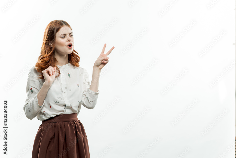 pretty elegant woman in suit stimulates with hand studio pretty elegant woman in suit stimulates with hand studio