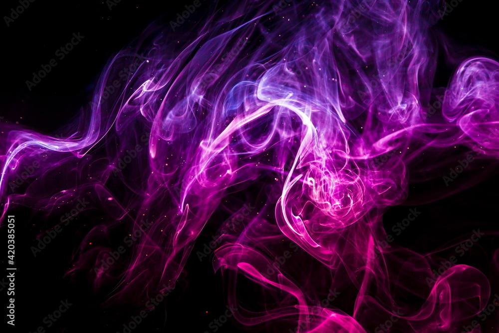 Colored smoke on black background Colored smoke on black background