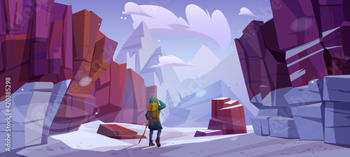 Traveler at winter mountains, travel journey.