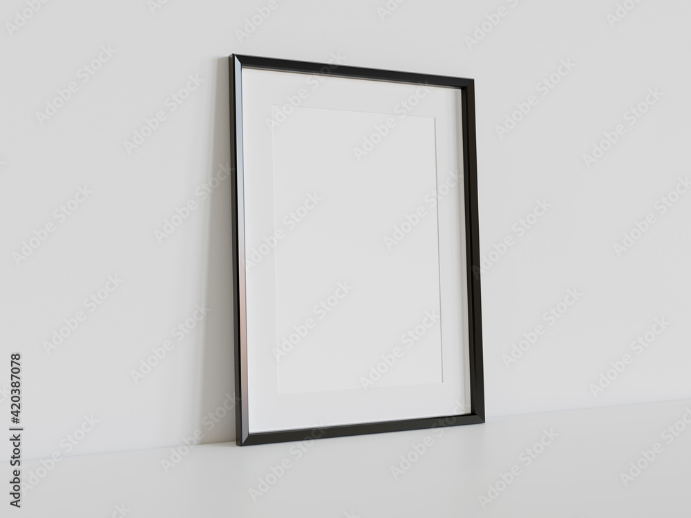 Black frame leaning on white floor in interior mockup. Template of a picture framed on a wall 3D rendering Black frame leaning on white floor in interior mockup. Template of a picture framed on a wall 3D rendering