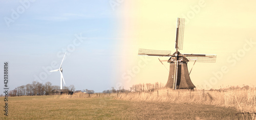 Old windmill and modern turbine in the Netherlands - Old meets new