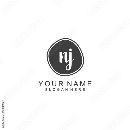 NJ beautiful Initial handwriting logo template © saturnus