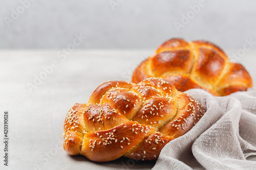 Obraz na plátně Homemade rose braid bread with sesame seeds