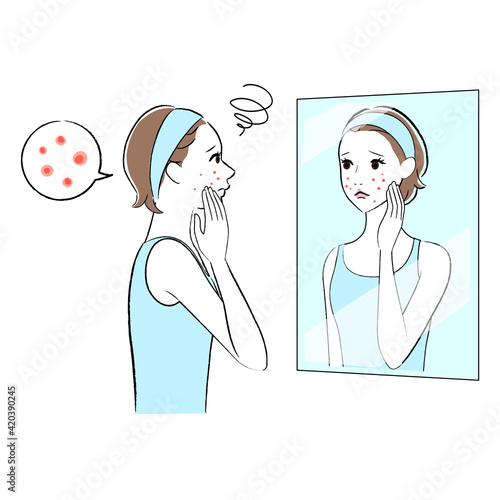 ニキビ　鏡を見る女性　困る