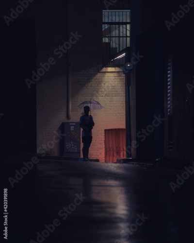 Man alone in a dark alleyway © Southern Creative