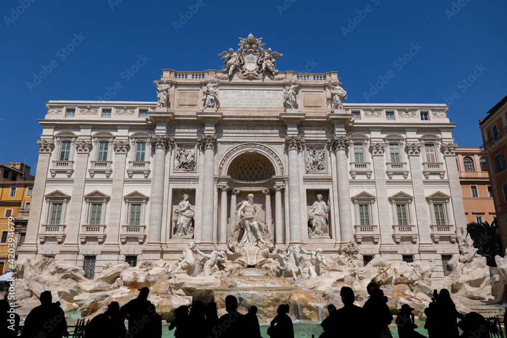 Trevi Fountain and People Silhouette in Rome, Italy