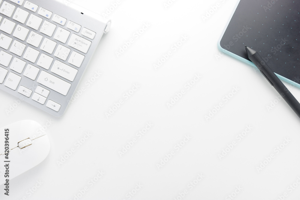 Flat lay, top view office table. Office supplies, keyboard, mouse, and pen mouse on white office table background with copy space, workspace blank. Office table concept. - obrazy, fototapety, plakaty 