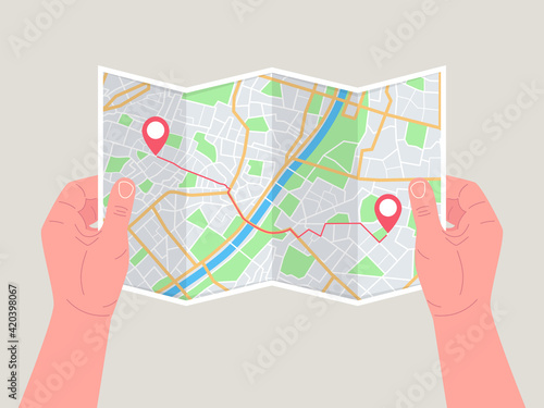 Hands holding paper map. Folded map in hands of men. Tourist look at map of the city to the river, is looking for. Vector.