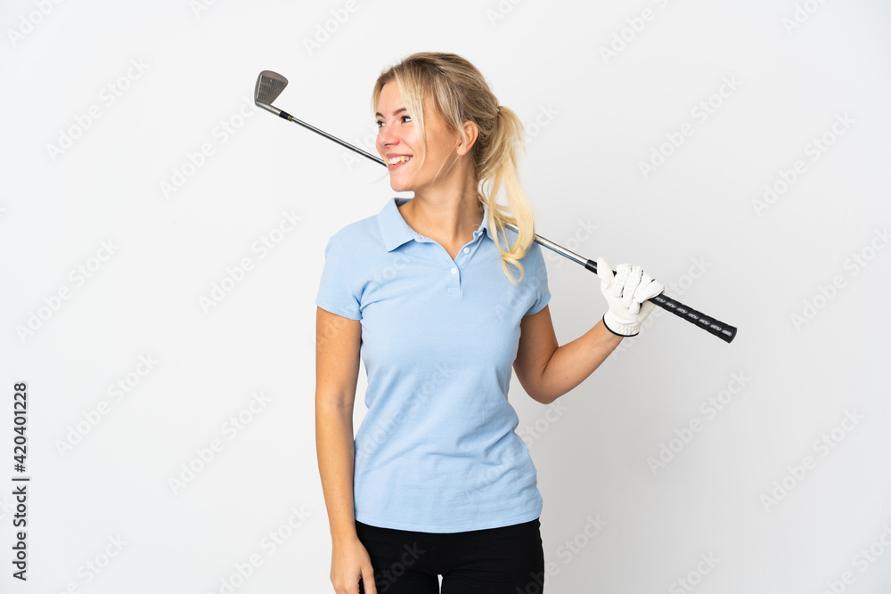 Young Russian golfer woman isolated on white background looking side Young Russian golfer woman isolated on white background looking side