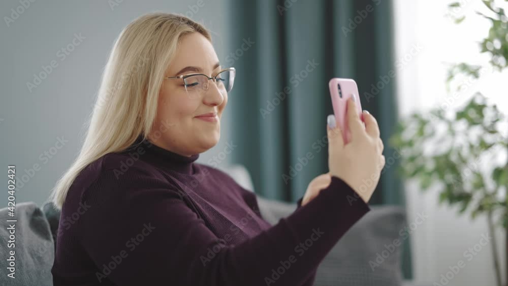 Plus size woman with smartphone Plus size woman with smartphone