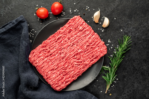 fresh minced meat on stone background