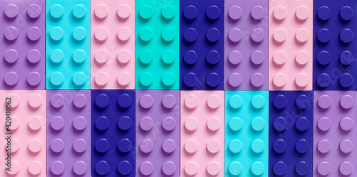 Fotografia Many toy blocks in different colors making up one large square shape in top view