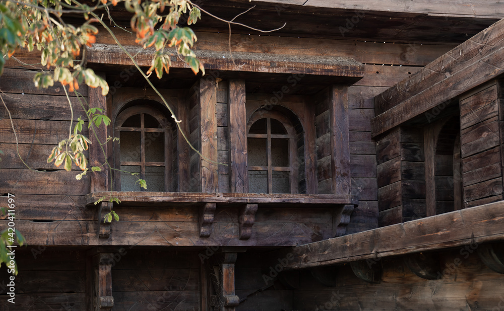 Old wooden house with wooden windows and shutters. Old wooden house with wooden windows and shutters.