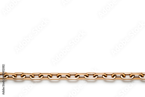 Gold modern massive chain necklace on light background. Pattern.